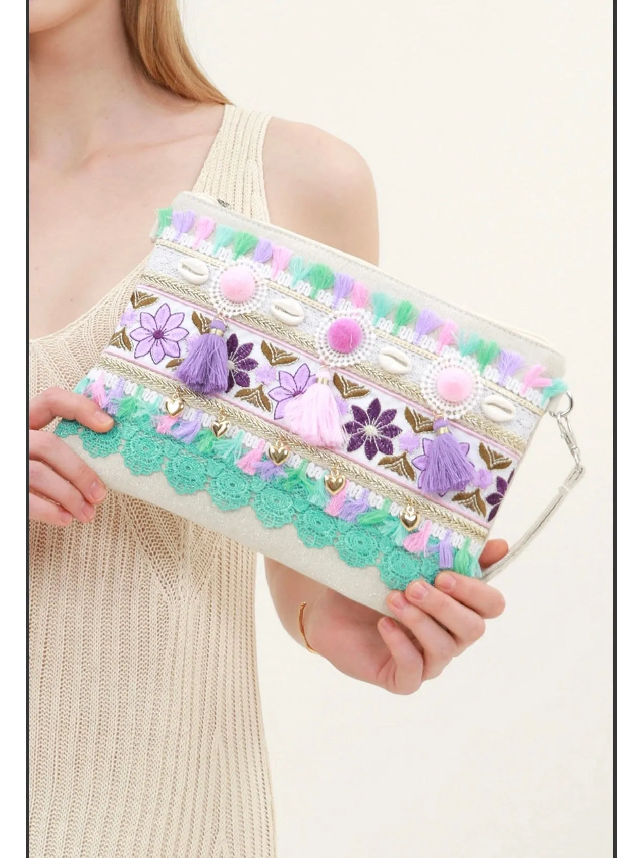 Penelope tassel clutch bag